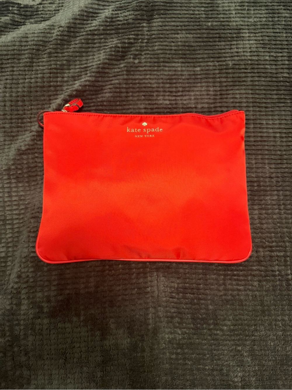 kate spade red nylon pouch with gold logo